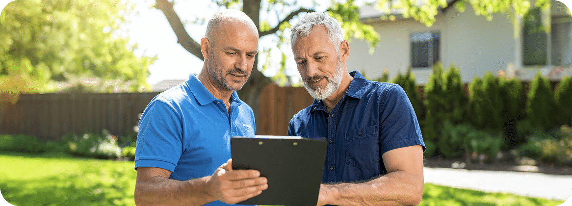 A contractor is showing a customer loan offers.
