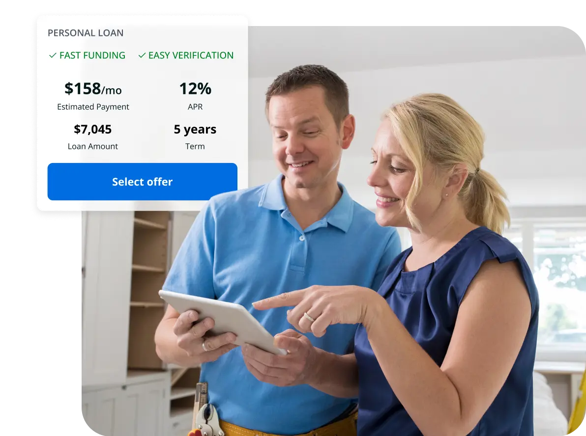 client-reviewing-offers-with-contractor Client and Contractor reviewing loan offers together.