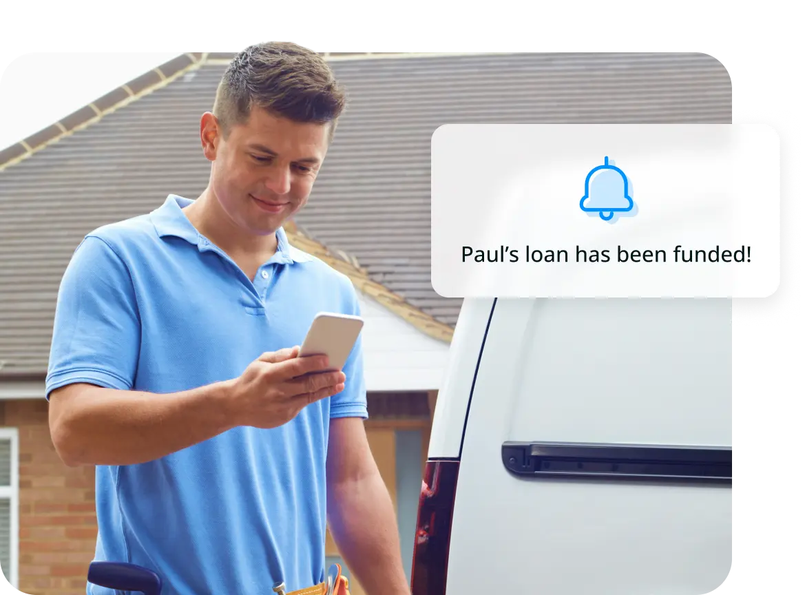 contractor-getting-notifications A Contractor is reviewing a funding notification on his phone.