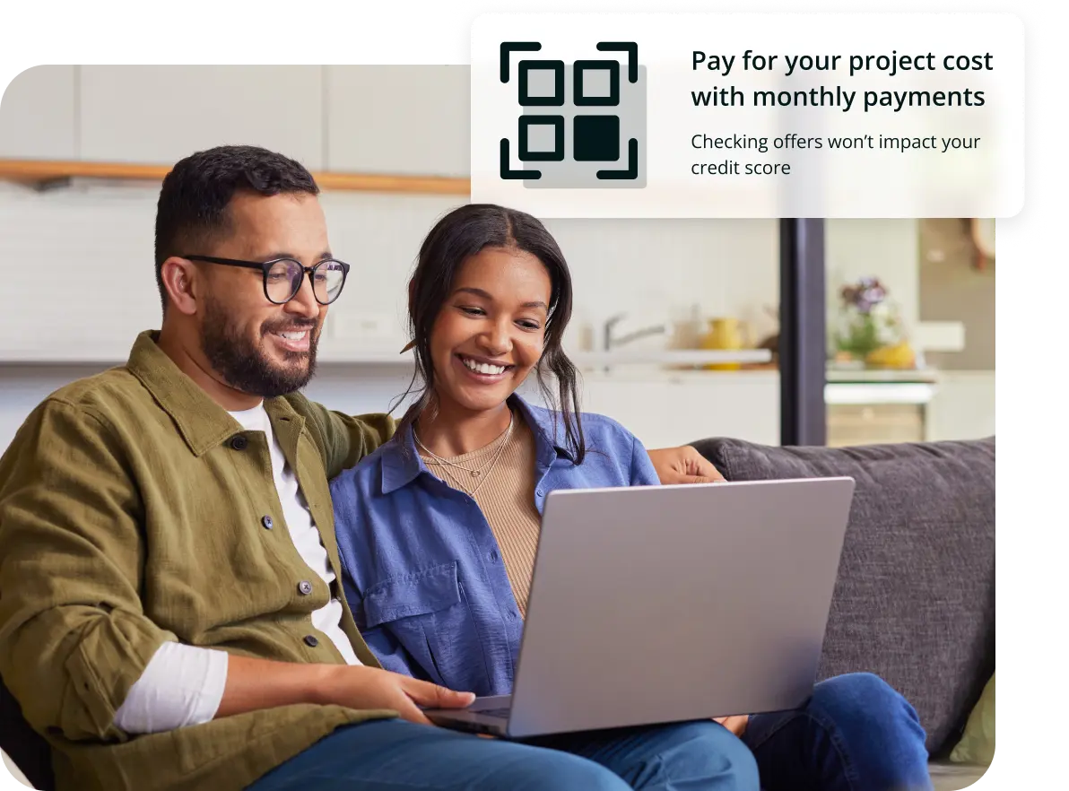 couple-looking-at-computer-for-financing A couple is starting a loan application on a computer.